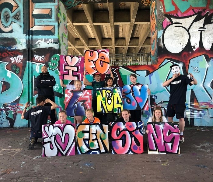 Organiseer een uniek kinderfeestje met een graffiti workshop